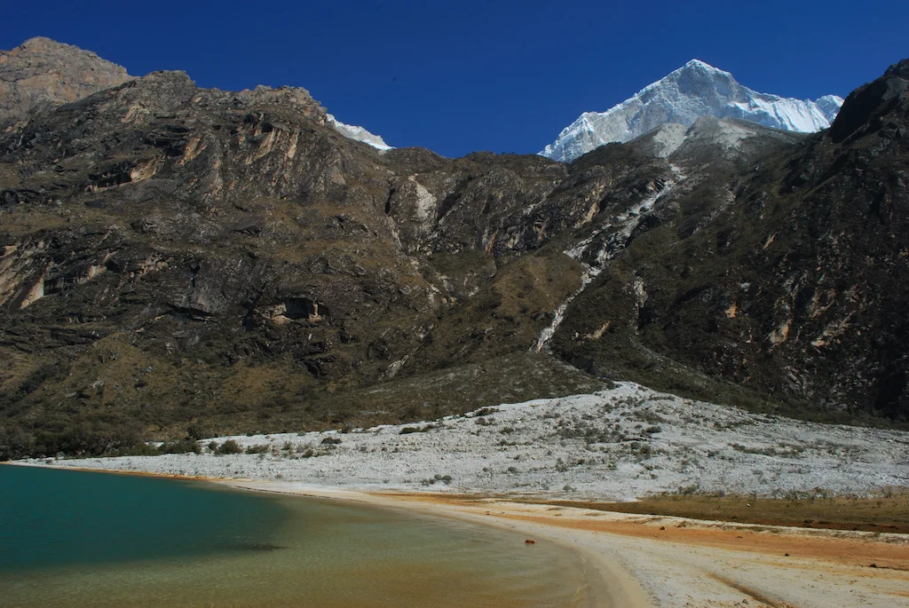 Snow-capped peak of Huandoy Mountain visible from Llanganuco Lakes.