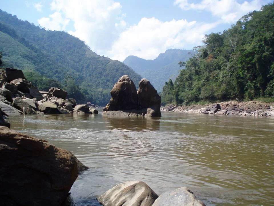 The Huallaga River framed by mountains.