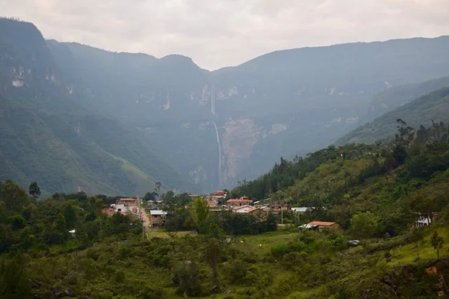 A view of Gocta Waterfall with the village of Cocachimba in the foreground.