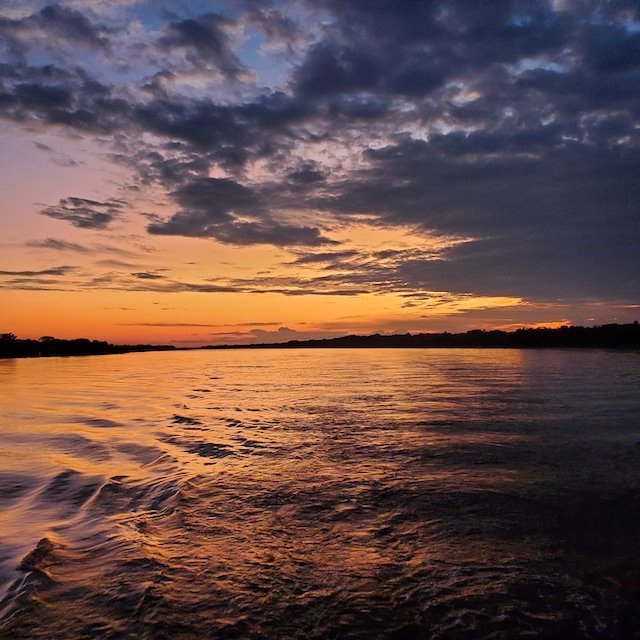 Dwyer x 2 - La Perla Amazon Cruise - Iquitos - Sunset over River.jpg