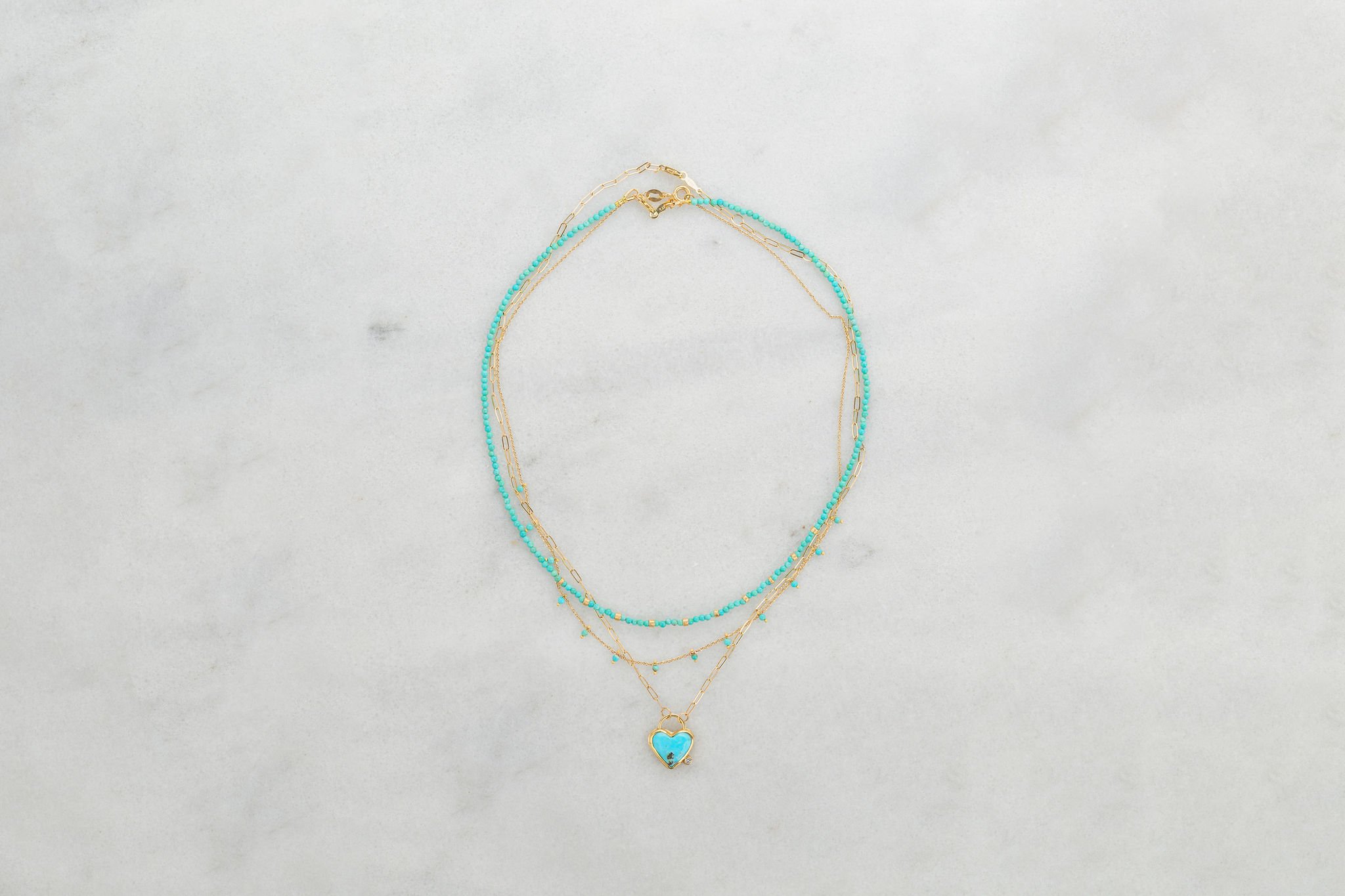 turquoise_gold_necklace_stack.jpg