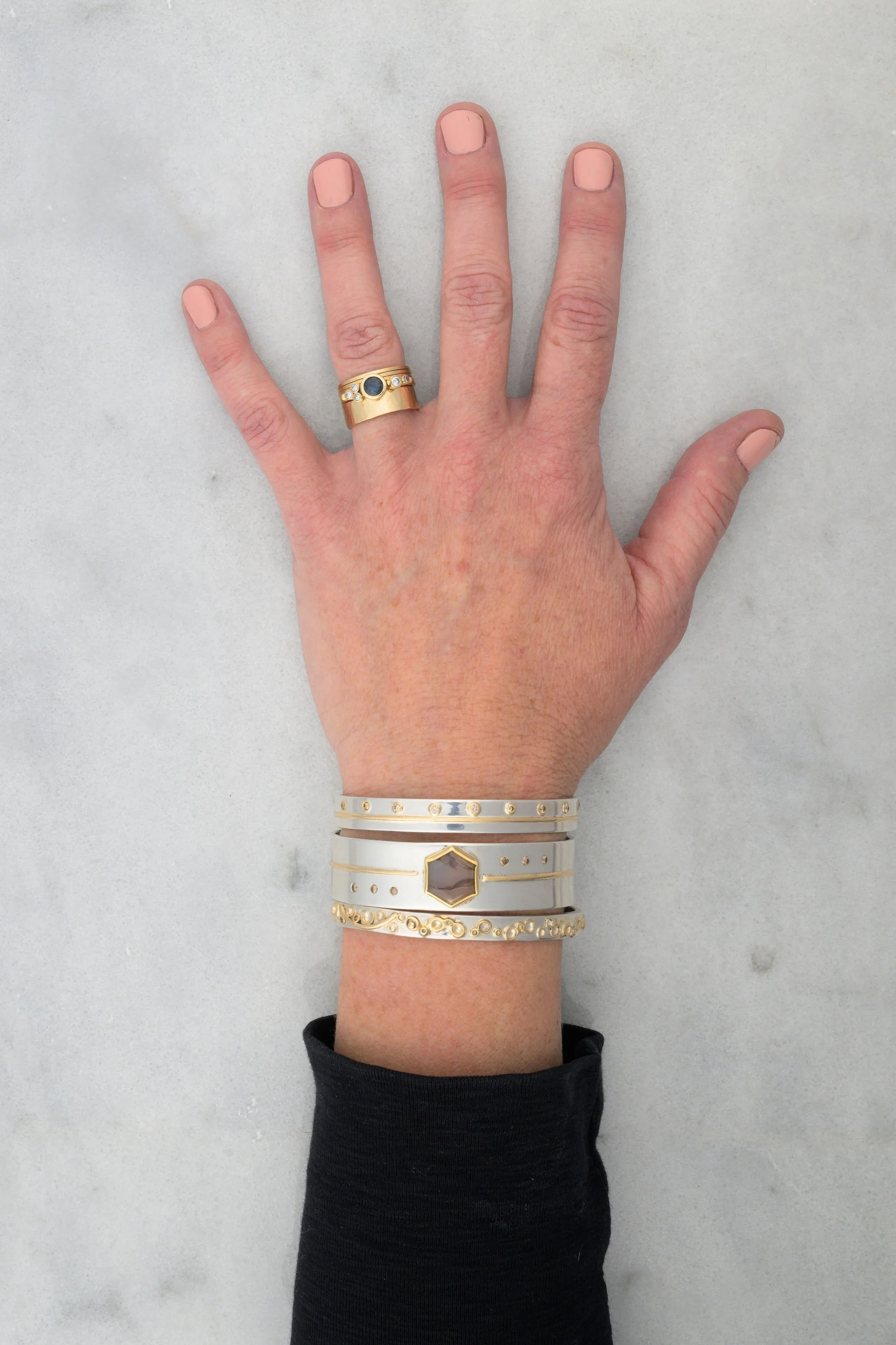 montana_sapphire_gold_ring_stack_model.jpg