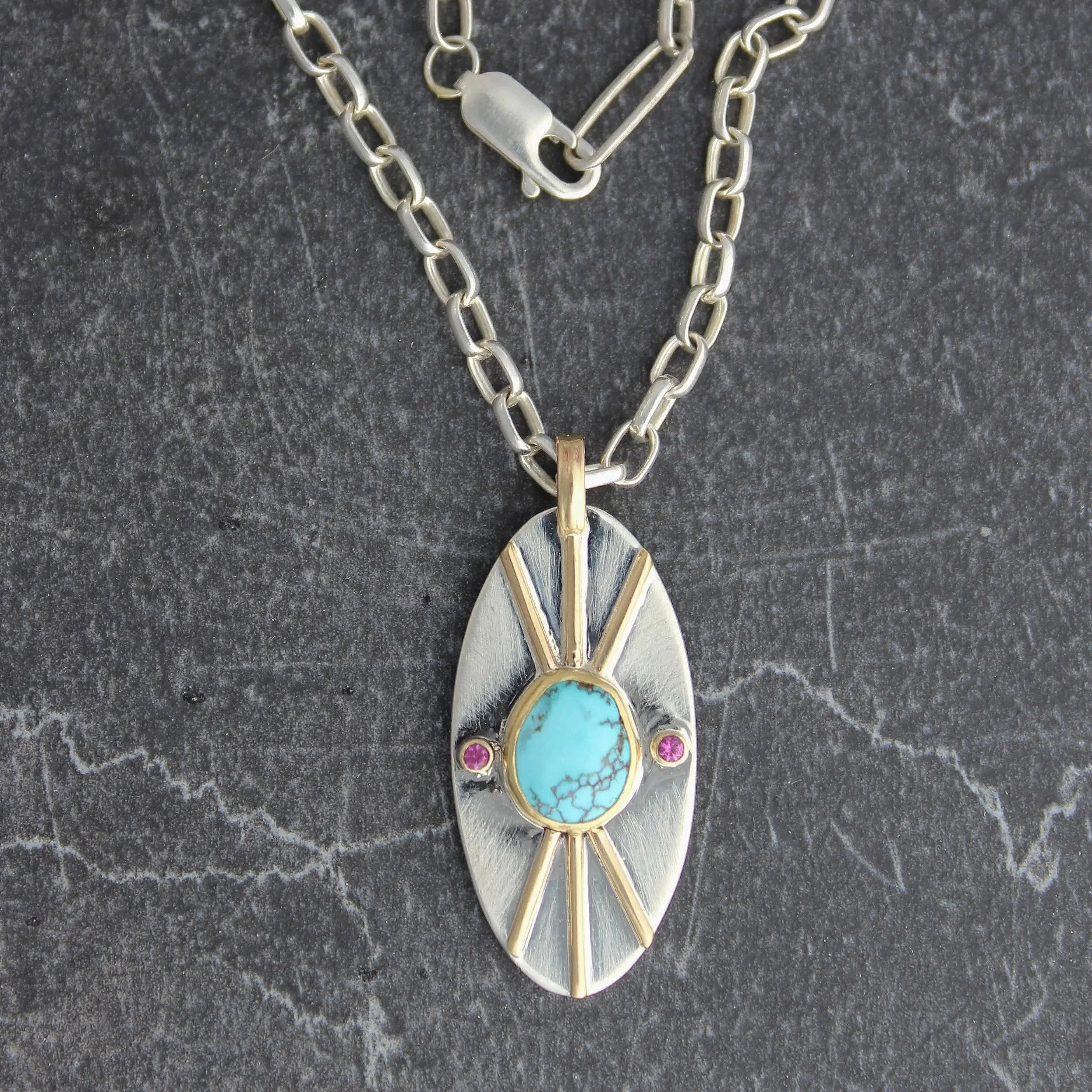 Organic Shaped Southwestern Turquoise Set Gold in The Middle of Long Silver Oval with Rubies Pendant on Chunky Silver Chain