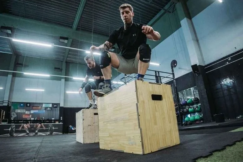 Why We Do Things Like Bar-Over-Burpees and Box Jump-Overs