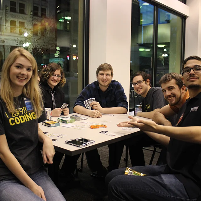 Students play card games at FReX in March 2015. 