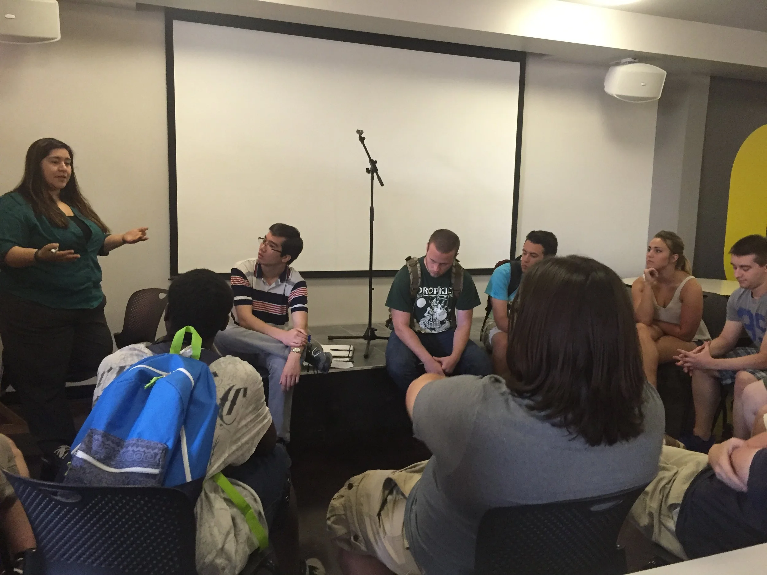 Director of Student Affairs Corrine Padilla chats with students about the role of Unified Student Government at Neumont.