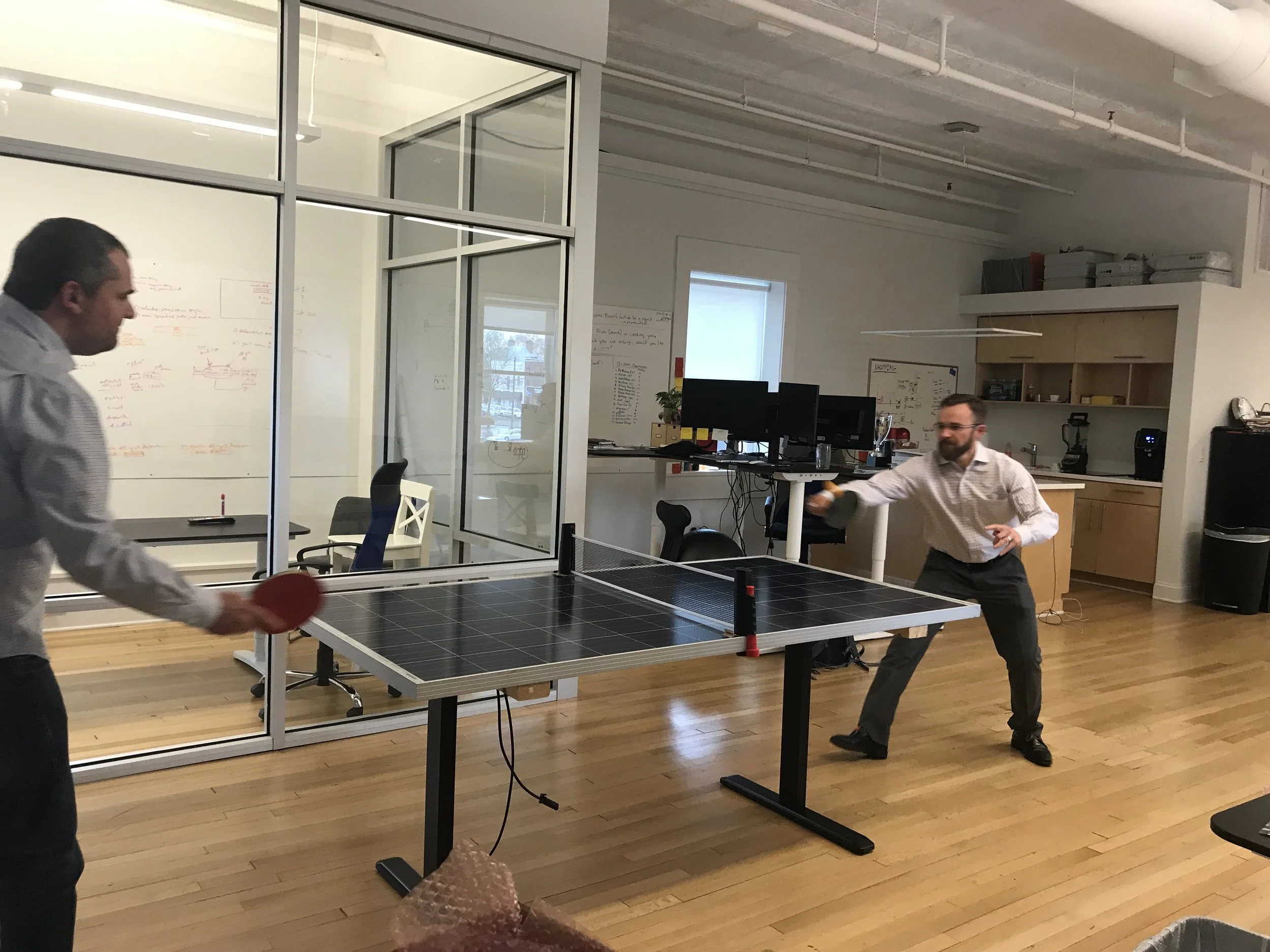 A game of SolarPong at the Lumin Office