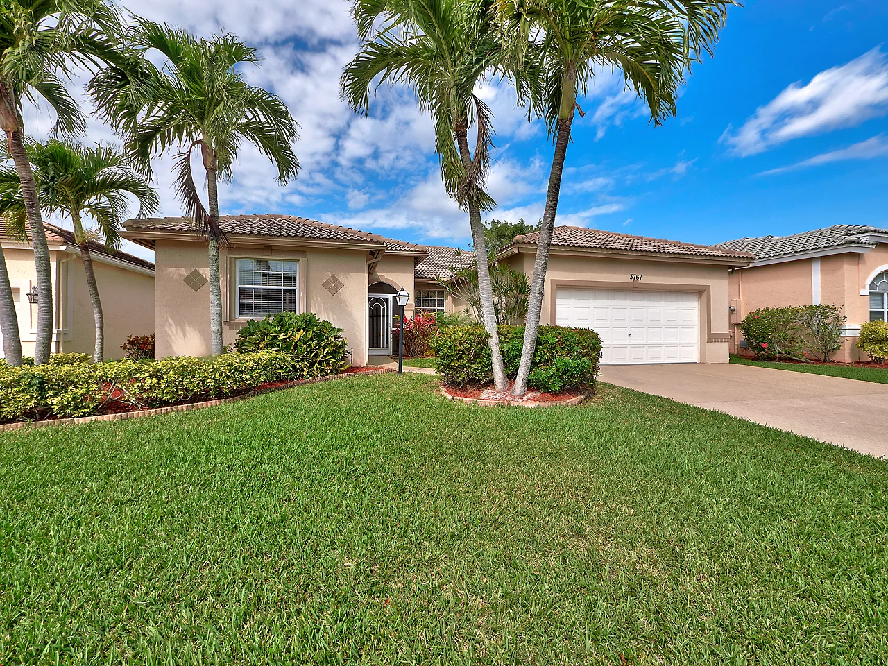 Updated, meticulously maintained w/ spacious, open floor plan in outstanding, gated 55+ community. Upgrades & Updates throughout. Kit w/Silestone, Stainless Steel Appliances. Large Family Rm opens to Kit. Glass Enclosed SunRoom. Master Suite w/his+her's closets & luxury bath w/double sink vanity, soaking tub, separate shower & water closet. Separate Laundry Rm w/Washer/Dryer, laundry tub & extra cabinets. Tile Floors throughout/no carpeting. Custom millwork detail. Newer AC. Nice fenced backyard. Quality CBS construction w/accordion hurricane shutters. Summer Chase is the best kept secret in PBC w/low HOA dues (covers lawn maintenance, basic cable & rubbish pick up. Amenities incl Clubhouse, tennis cts, bocce, pool/spa, fitness ctr & fun, inclusive, organized events year round. Pet friendly!