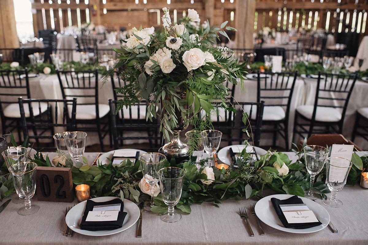 Photo by Hugh Whitaker — Floral arrangements by Karen Cal of Cedar & Stone Floral Studio .