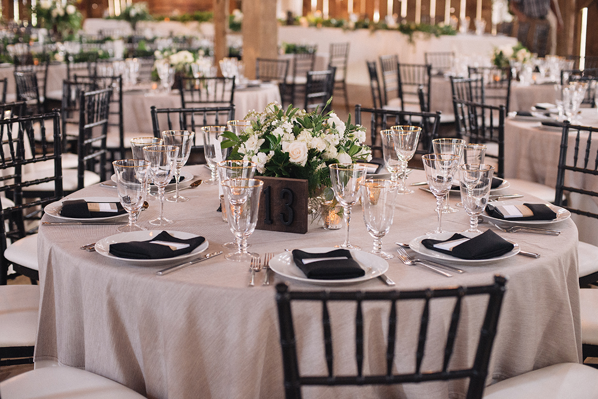 Photo by Hugh Whitaker — Floral arrangements by Karen Cal of Cedar & Stone Floral Studio .