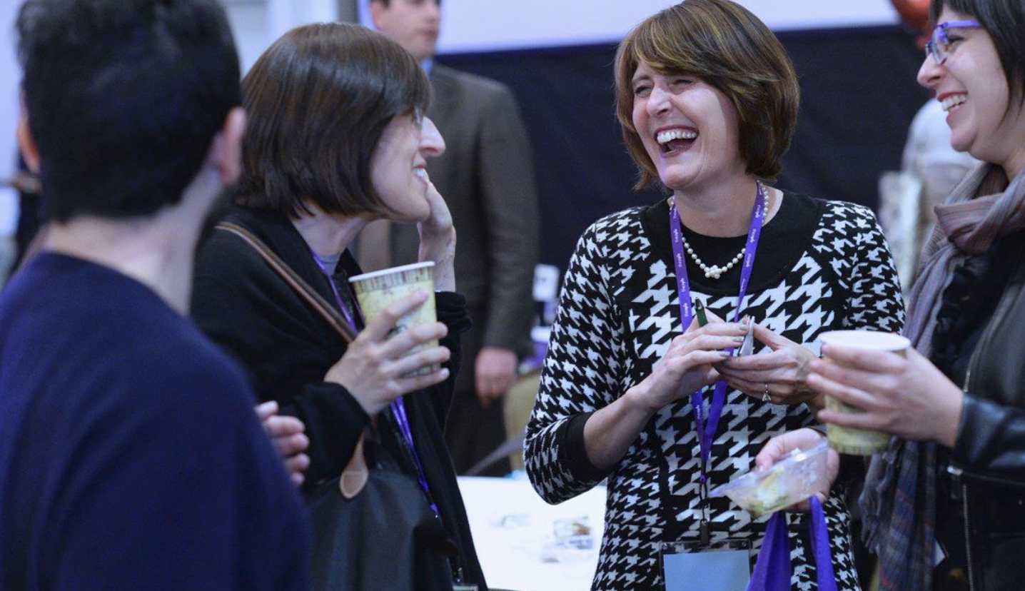 Doctors talking together at a conference