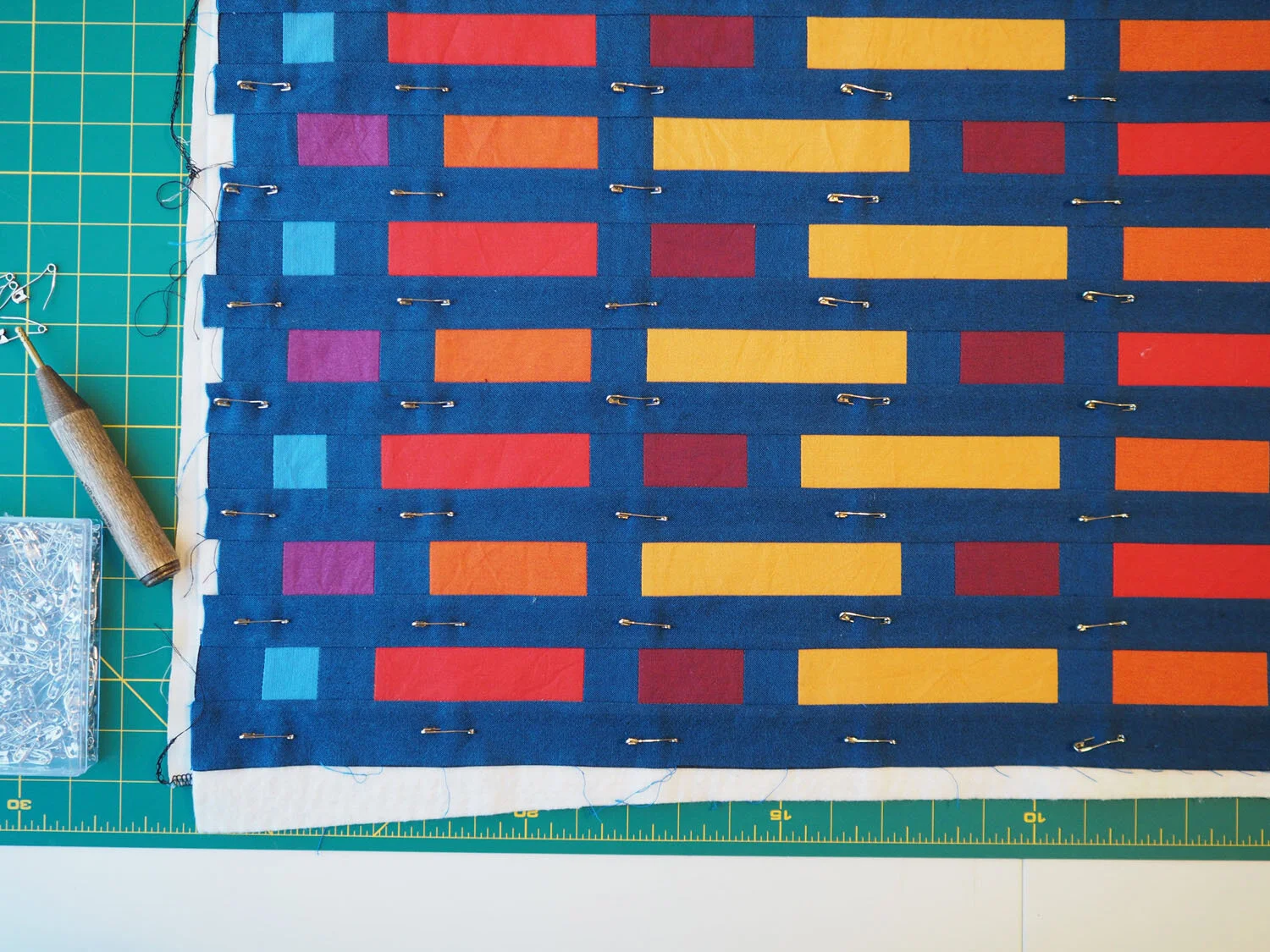  The pillowcase is basted with pins and ready to be quilted 