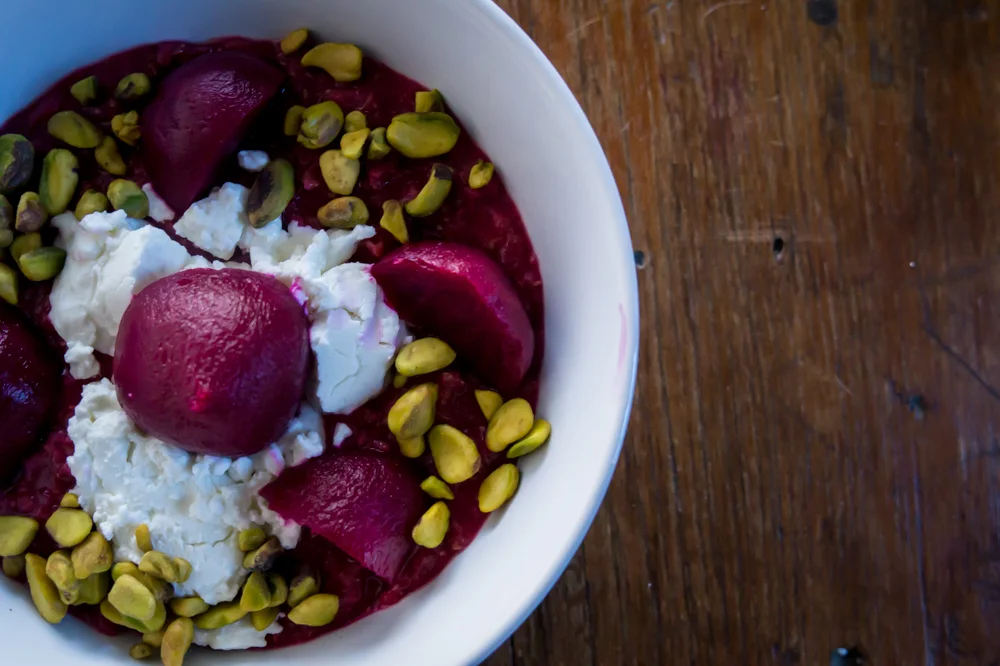 Beet Oats topped with beets, goat cheese, and pistachios!