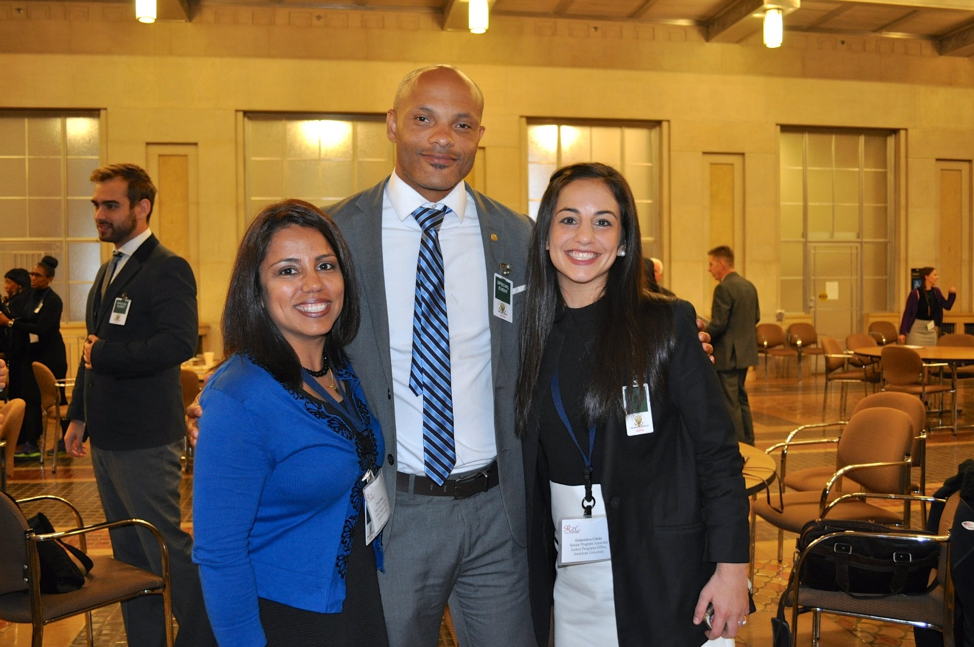 JPO’s  Preeti Menon  and  Genevieve Citrin Ray  with  Toussaint Romain , former Assistant Public Defender, Mecklenburg County Public Defender’s Office (center)