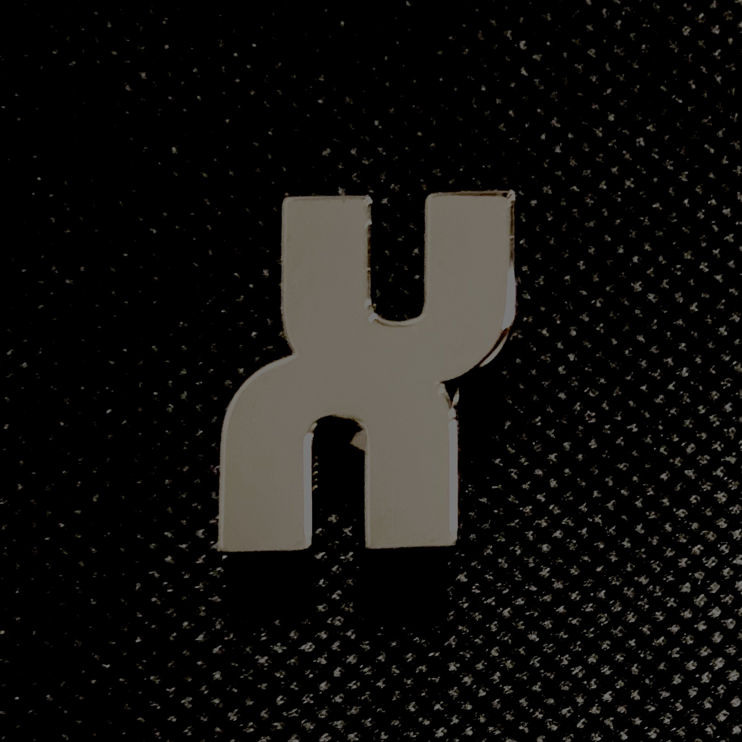 XAMBUCA Pattern Stamp Logo Metal Lapel Pin