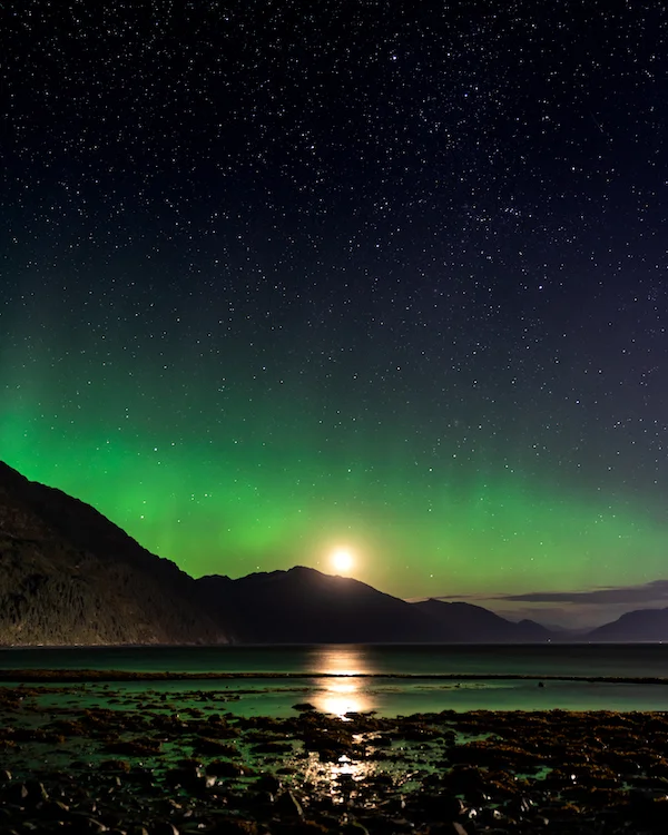 I took this photograph around 1am during our Alaska photo expedition. The Aurora Borealis on the Prince William Sound!