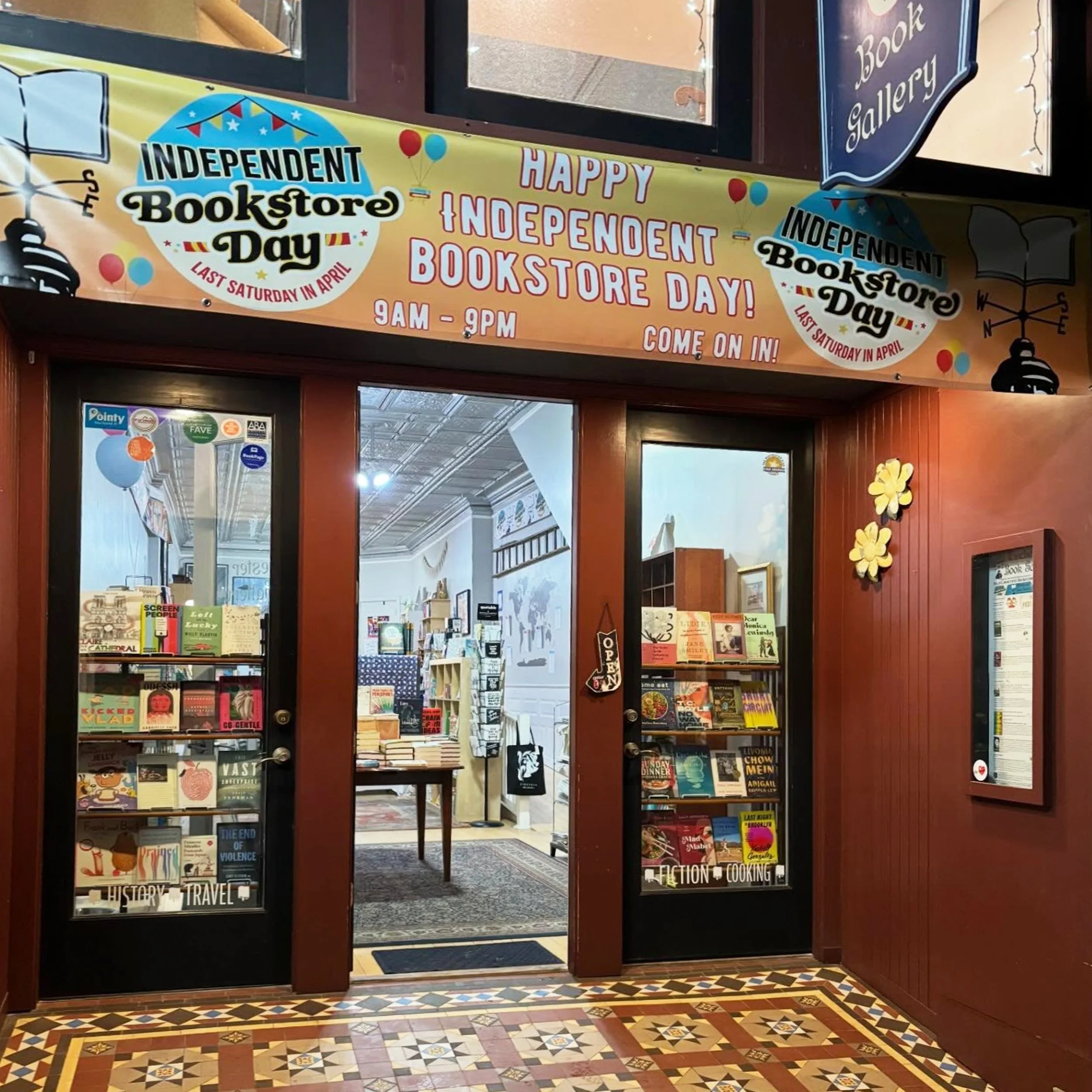 small business bookstore located on the walking mall in winchester virigina with window displays of booksis a favorite place for designers