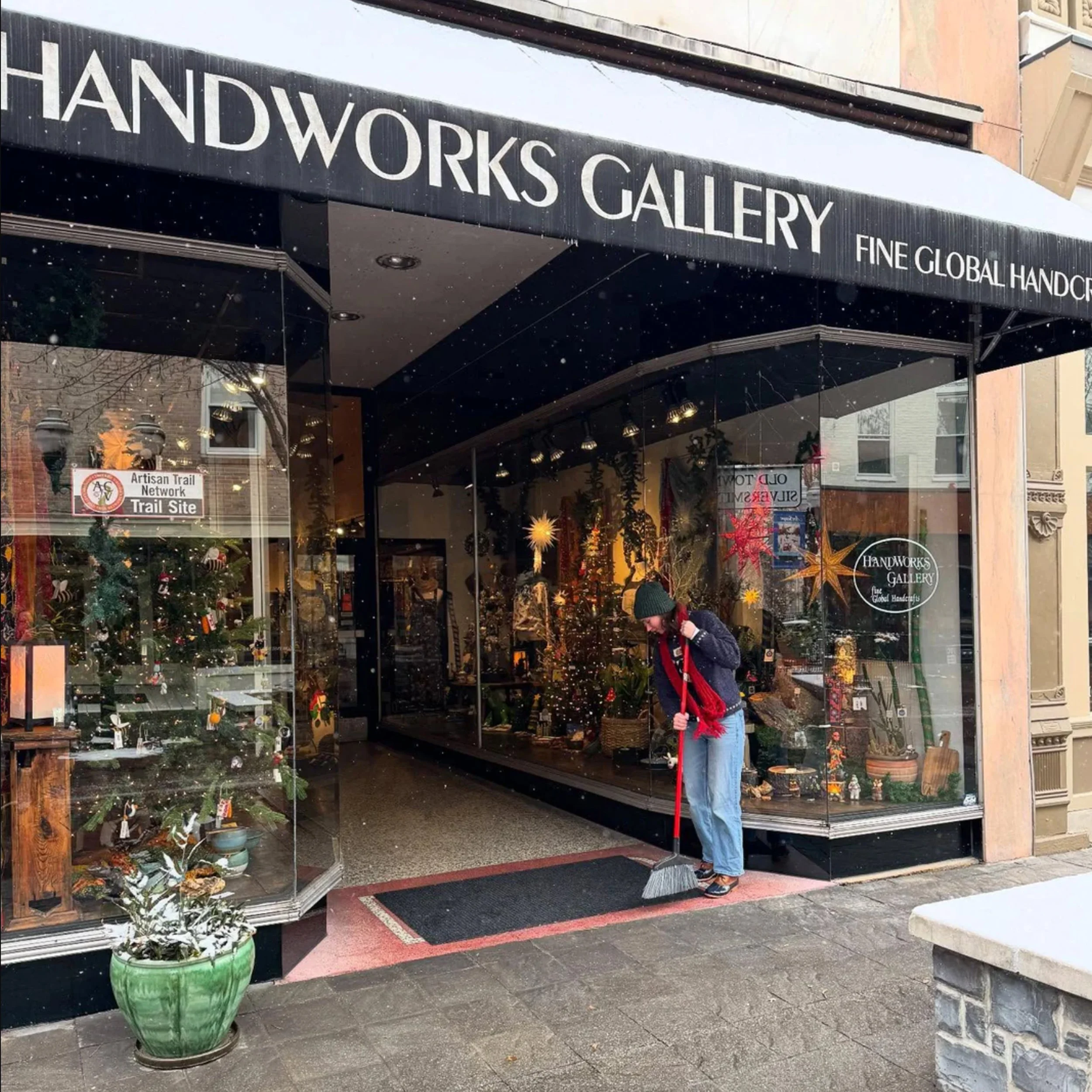 storefront with large glass windows featuring handmade gifts and accessories from around the world is a favorite shopping destination for the winchester va interior designer