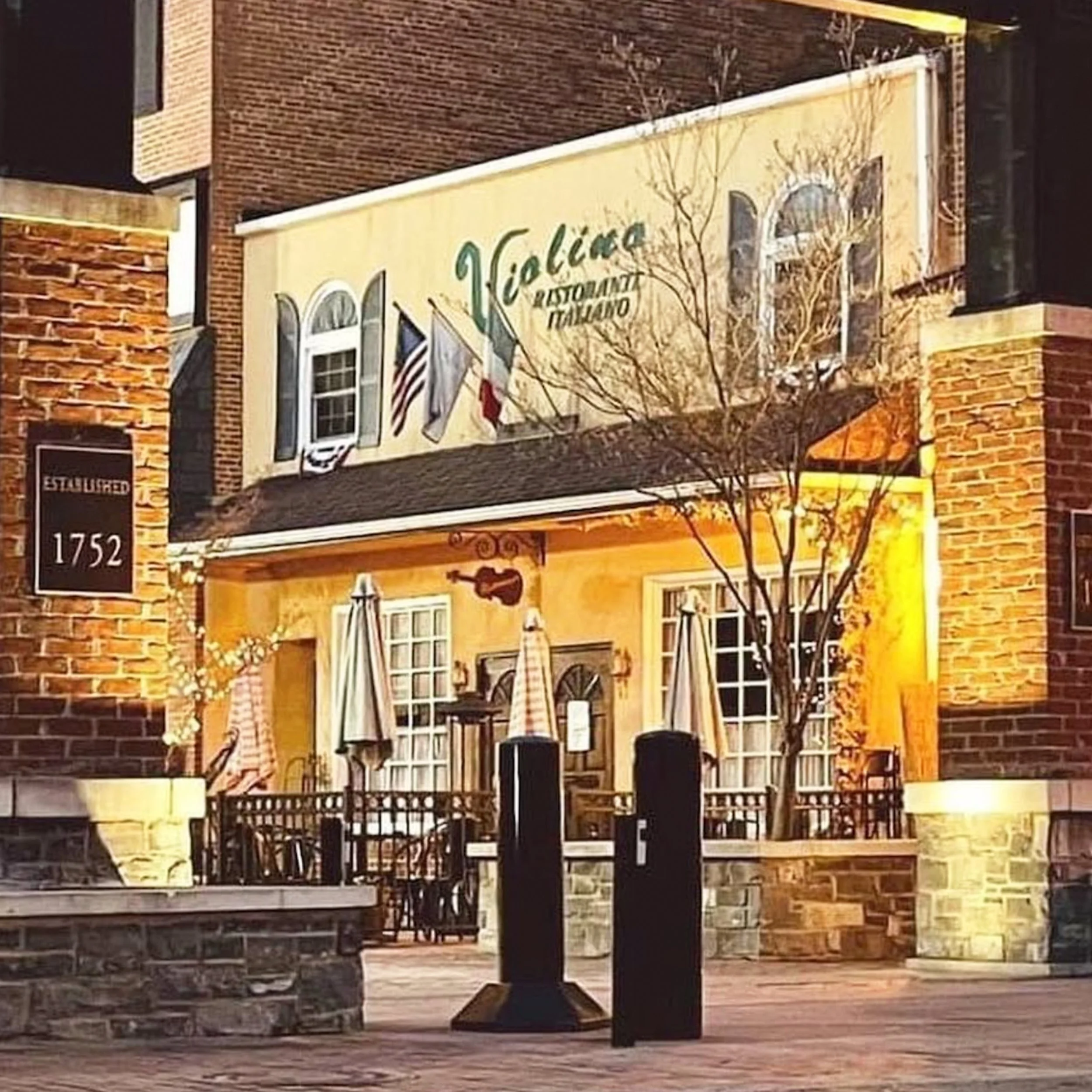 This Italian family owned restaurant with yellow stucco walls and outdoor seating is a favorite spot for this interior designer