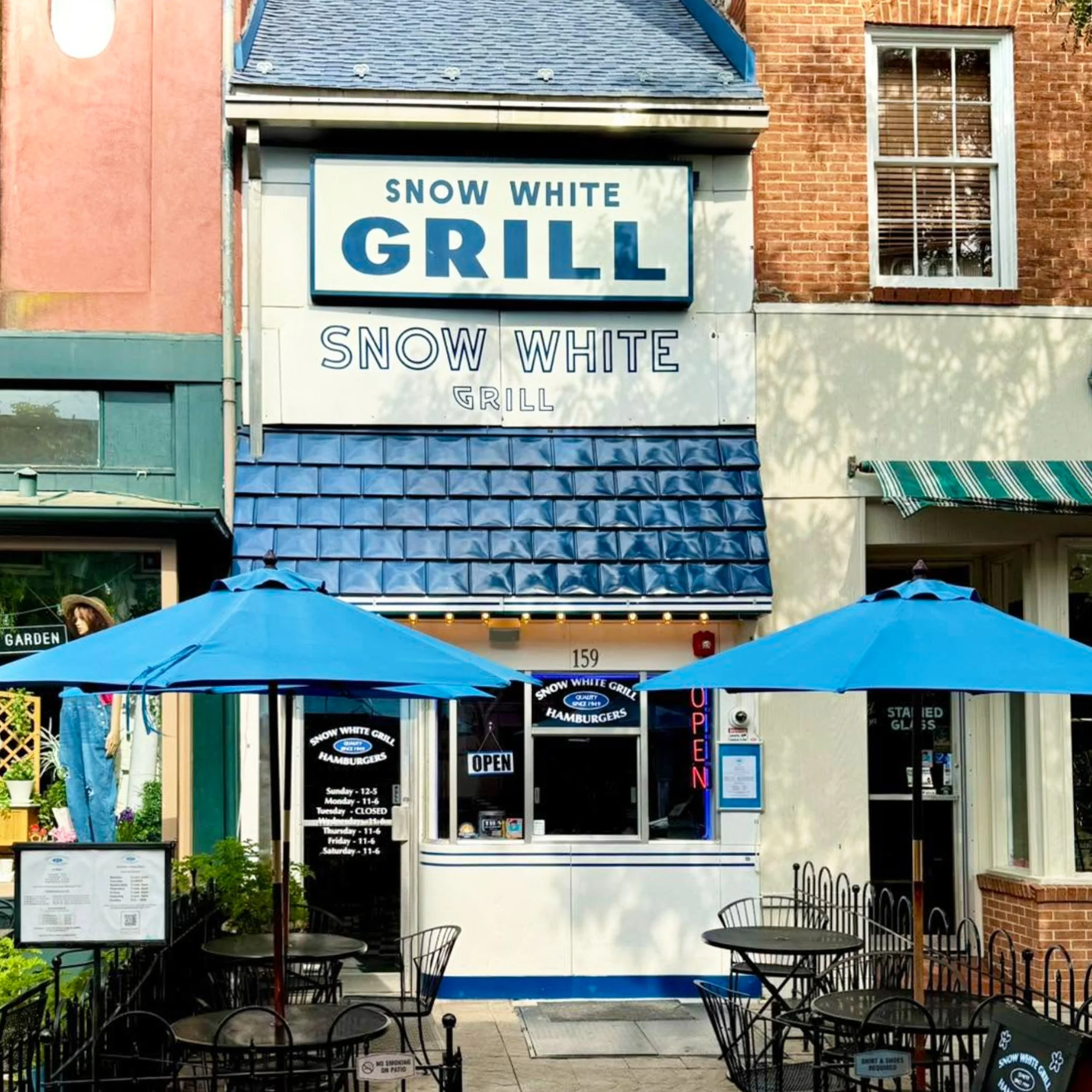 quaint blue and white hamburger spot located on walking mall in winchester virginia with walk up window to order