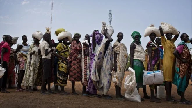 Queuing for food aid - civil war and economic collapse are being blamed. (AP)