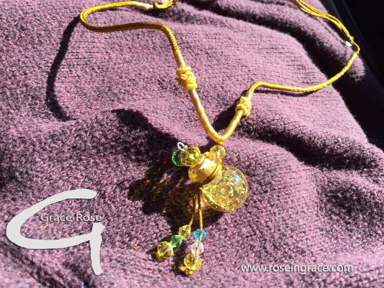 roseoil necklace topez.jpg