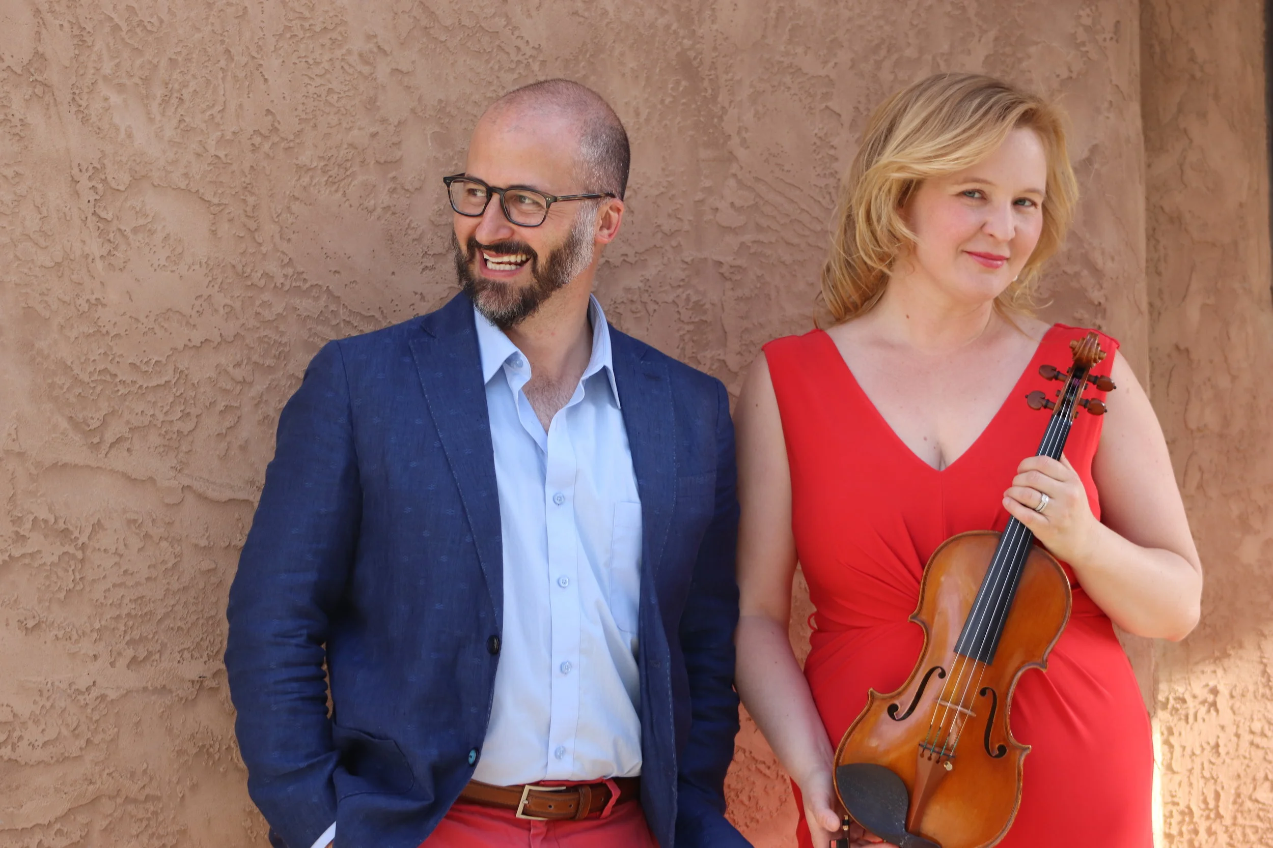 The Young Tiranno Duo was formed in 2018 after many years of performances together in opera and musical theater productions. Violinist/pianist Elizabeth Young-Tiranno and tenor John Tiranno, equally accomplished in their individual careers, have now joined forces as a duo to perform their unique and varied repertoire. Most recently heard in New York and New Mexico, they are the curators of the Las Palomas Concert Series in Santa Fe, now in its second season. Recently married, they make their home in Santa Fe but travel frequently for performances across the country.