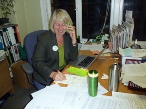 Adriane Carr works the phones at the Green Party head office in Gastown