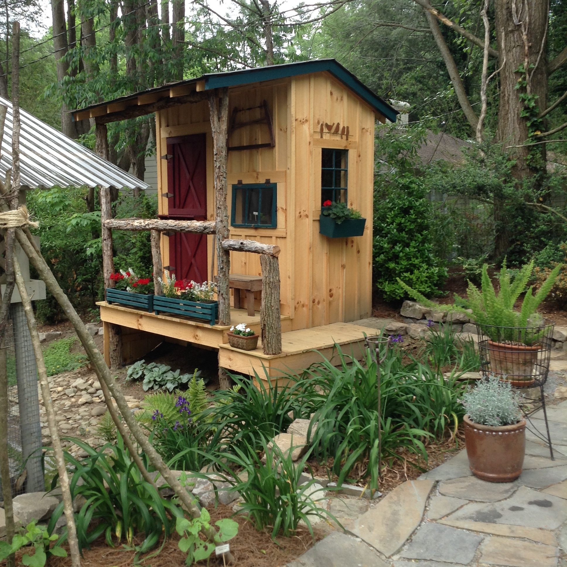 A garden shed with style can be incorporated into the garden, not hidden away behind the garage.