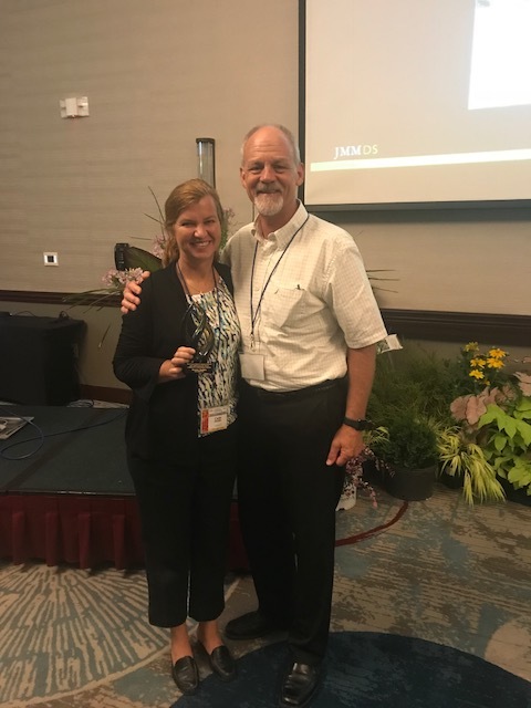 Bryce Lane, Lecturer and Undergraduate Coordinator, North Carolina State University, and member of the North Carolina Nursery and Landscape Association presented the award to Carla Stubbs.&nbsp;