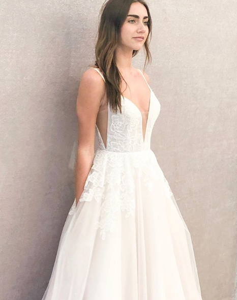Gown by Blush by Hayley Paige.