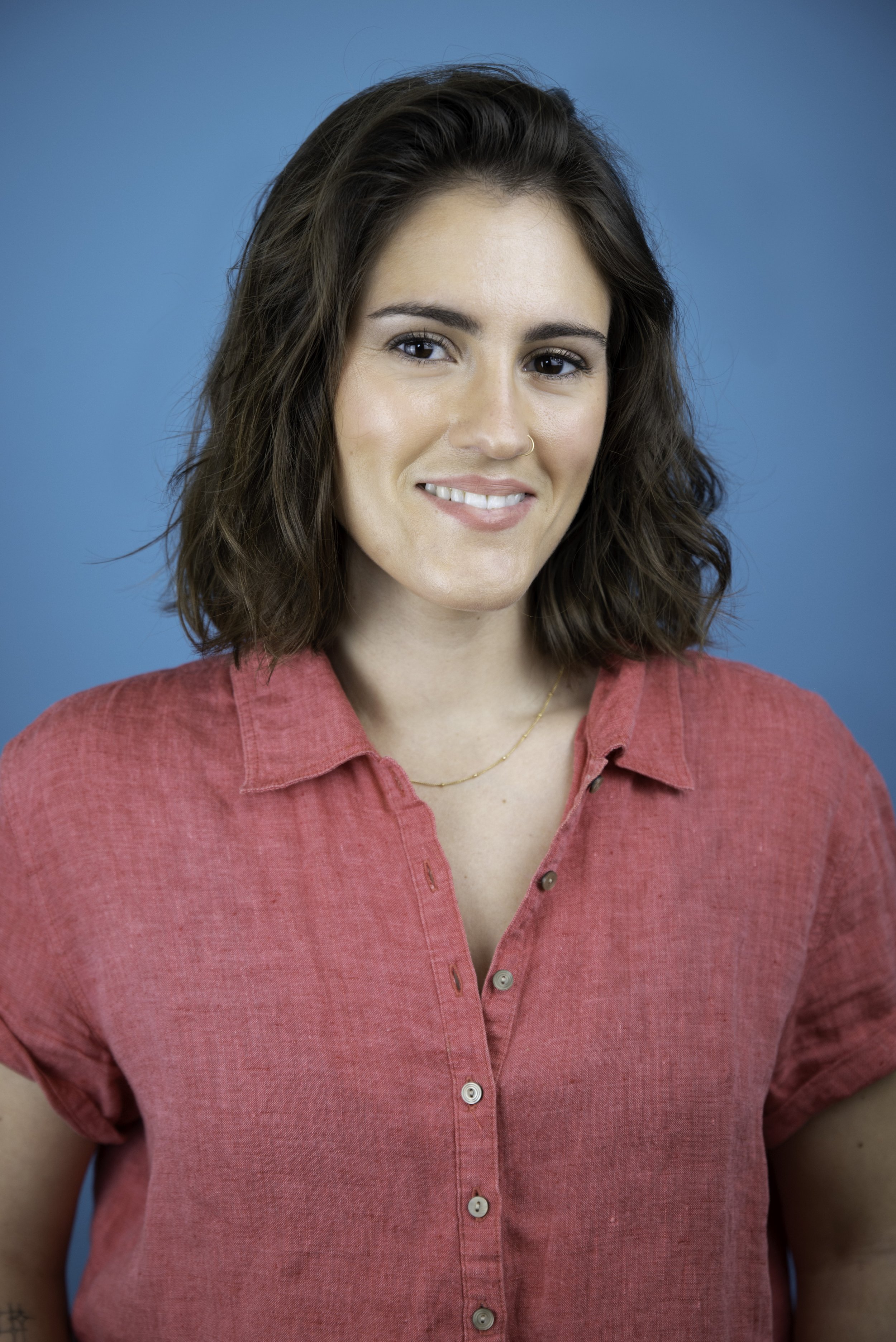 Chloe Kostman Headshot Blue.jpg