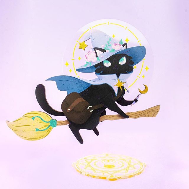 Flying her way through the stars ✨ 
This laser cut wood and acrylic desk toy was from the amazing collaboration I had with @stipplepopshoppe. Stella has lots of fun details such as the sparkly accents on her wand and hat, a kitty witch summoning circ