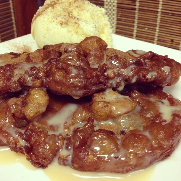 Maruya- banana fritters with vanilla ice cream topped with cinnamon