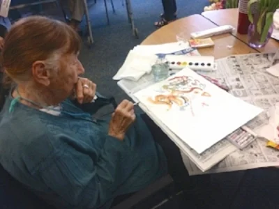 Eastside Friendship Center artist in a workshop led by Holly Nelson