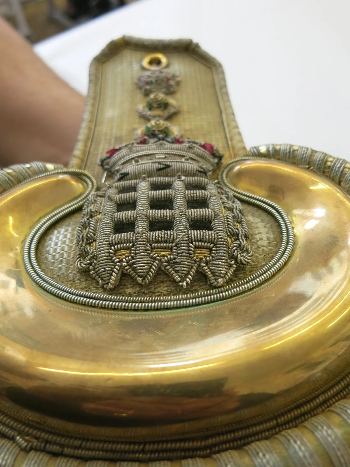 A vintage epaulette made at Hand & Lock