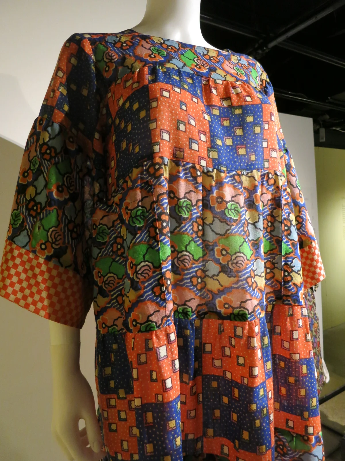 Liberty in Fashion exhibition at the Fashion & Textile Museum, Bermondsey, London 2015. This early 1970s dress was designed by Foale and Tuffin. They loved to mix prints and here they have used prints designed by Richard Nevill, Susan Collier and Sarah Campbell.
