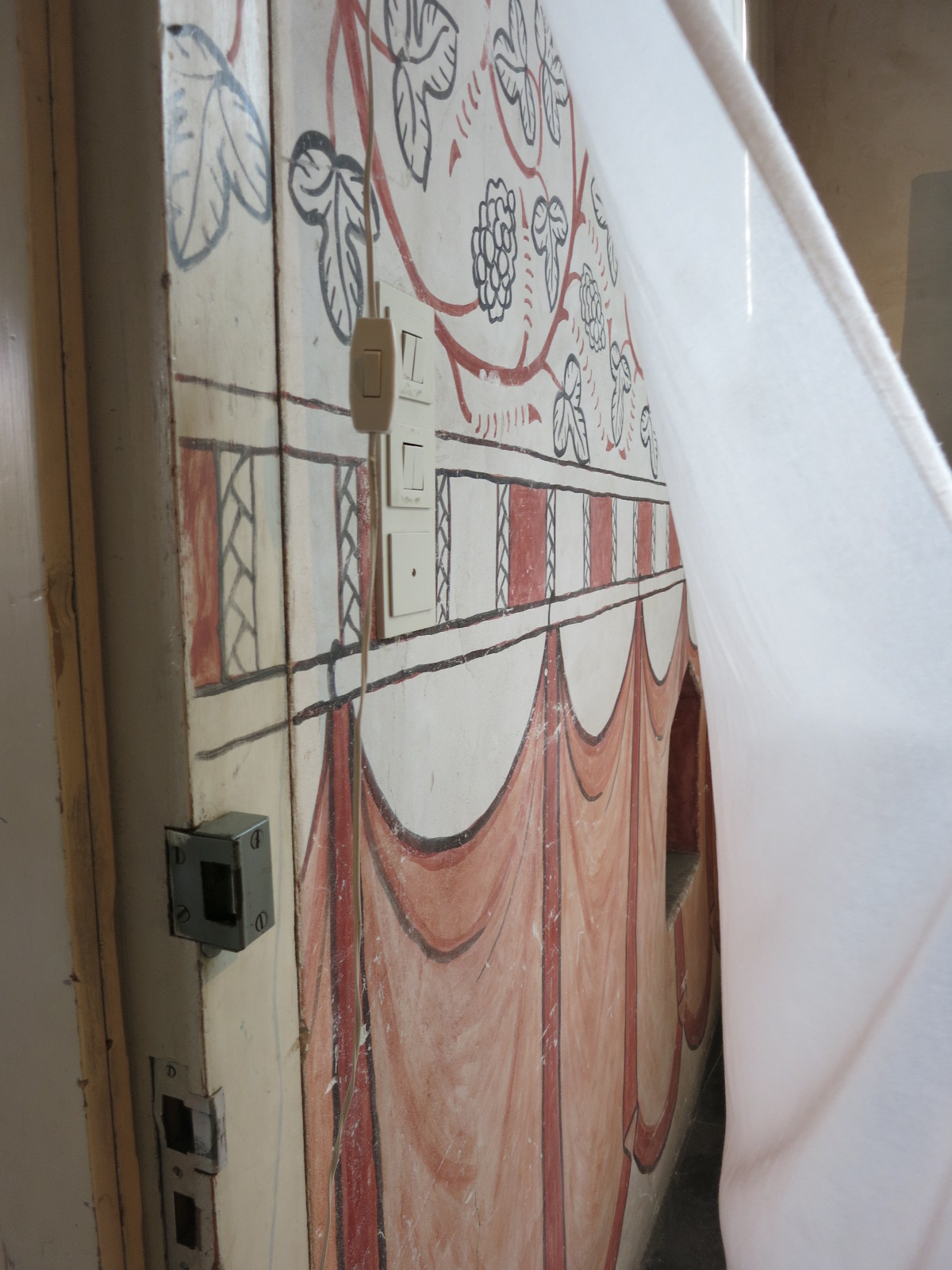 Drakenborch, Utrecht, Netherlands. It is now the store for Strandwest. The ancient wall frescoes are protected with a veil.