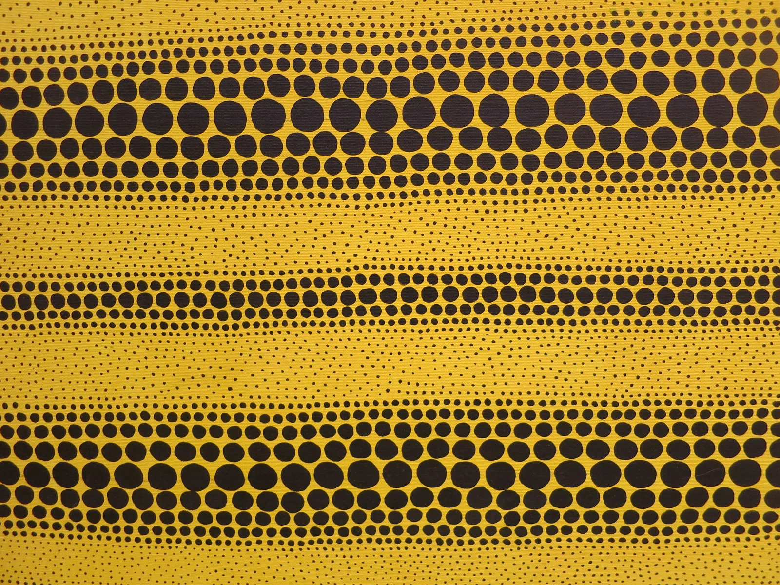 Yayoi Kusama's 1980s works in the In Infinity Retrospective at the Louisiana Museum of Modern Art, Denmark 2015. A detail of 'Yellow Dots' 1982