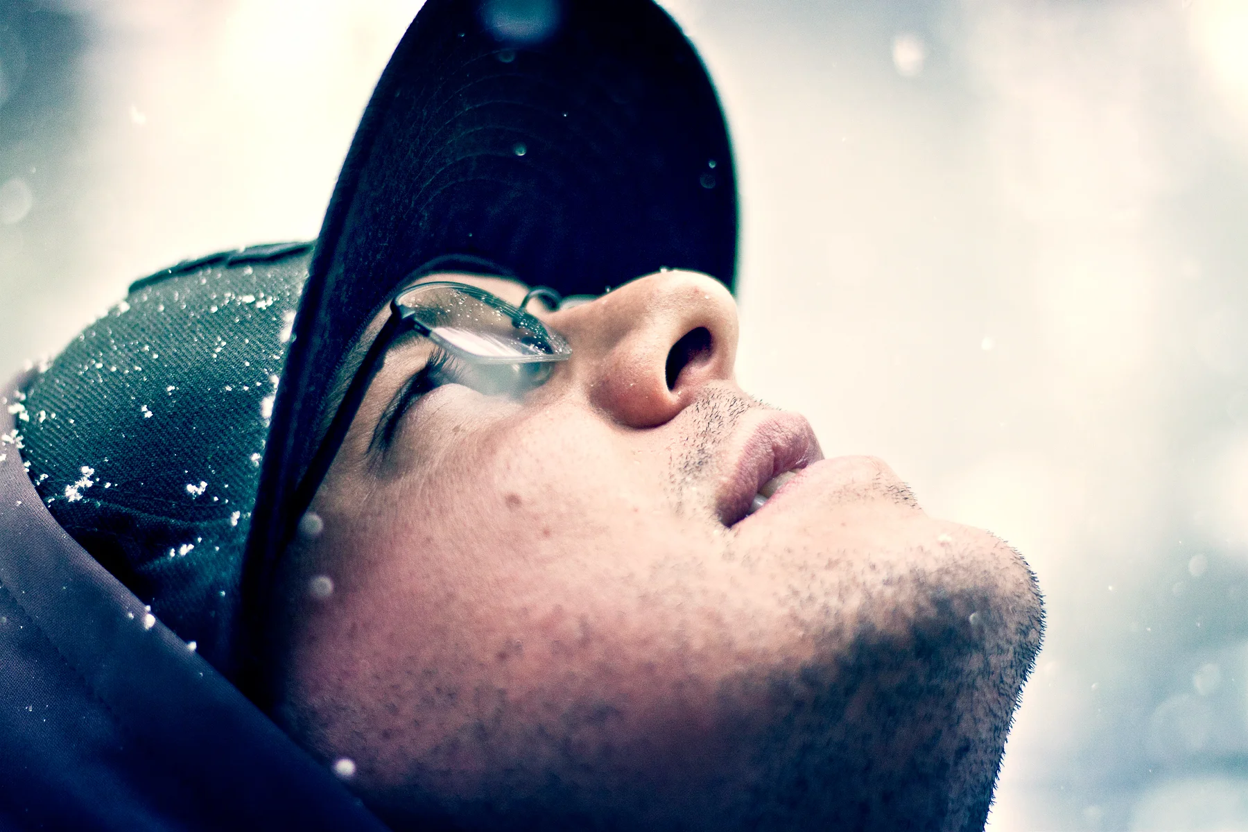 Chris-looking-up-at-snow-color_2021.jpg