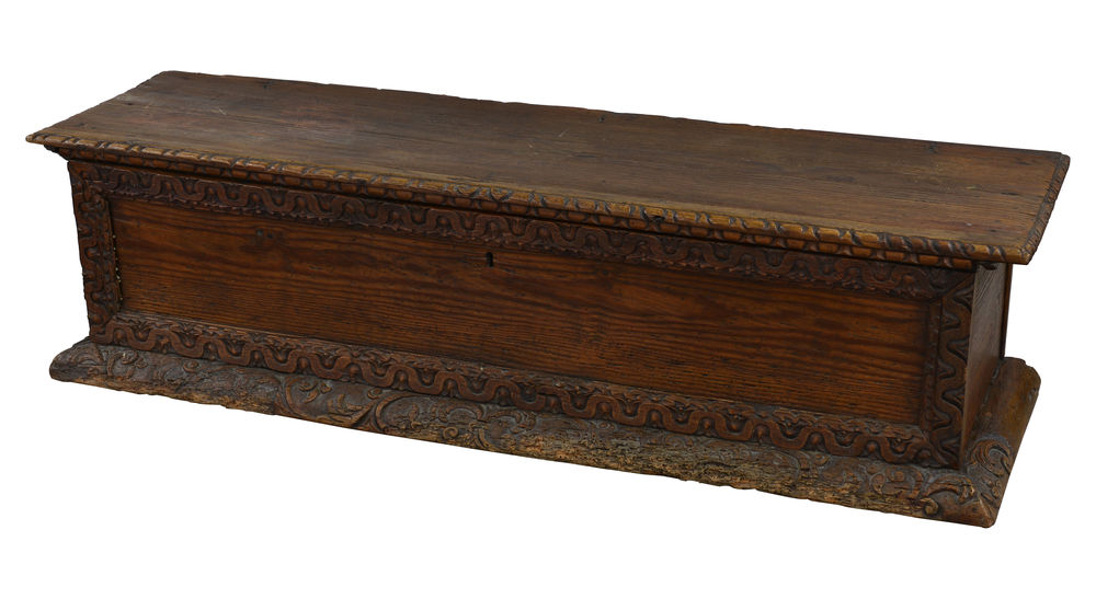 Trunk with carved frame and top