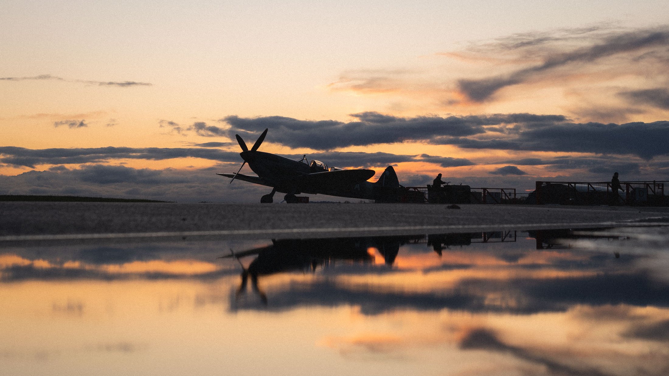AircraftRestorationCompany-ARCo-Spitfires-TwoSeatSpitfire-Hangar-Duxford_HomeGallery_ImageCredit-GeorgeLewisRomain.jpg