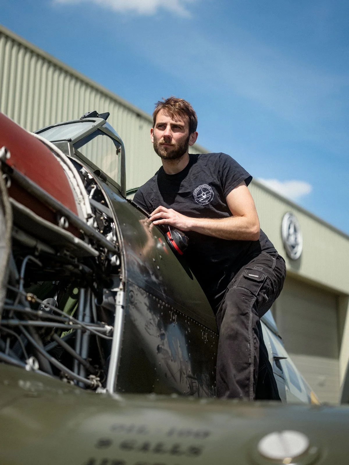 Hawker Hurricane IIB BE505 engineer running Rolls-Royce Merlin Engine during maintenance.