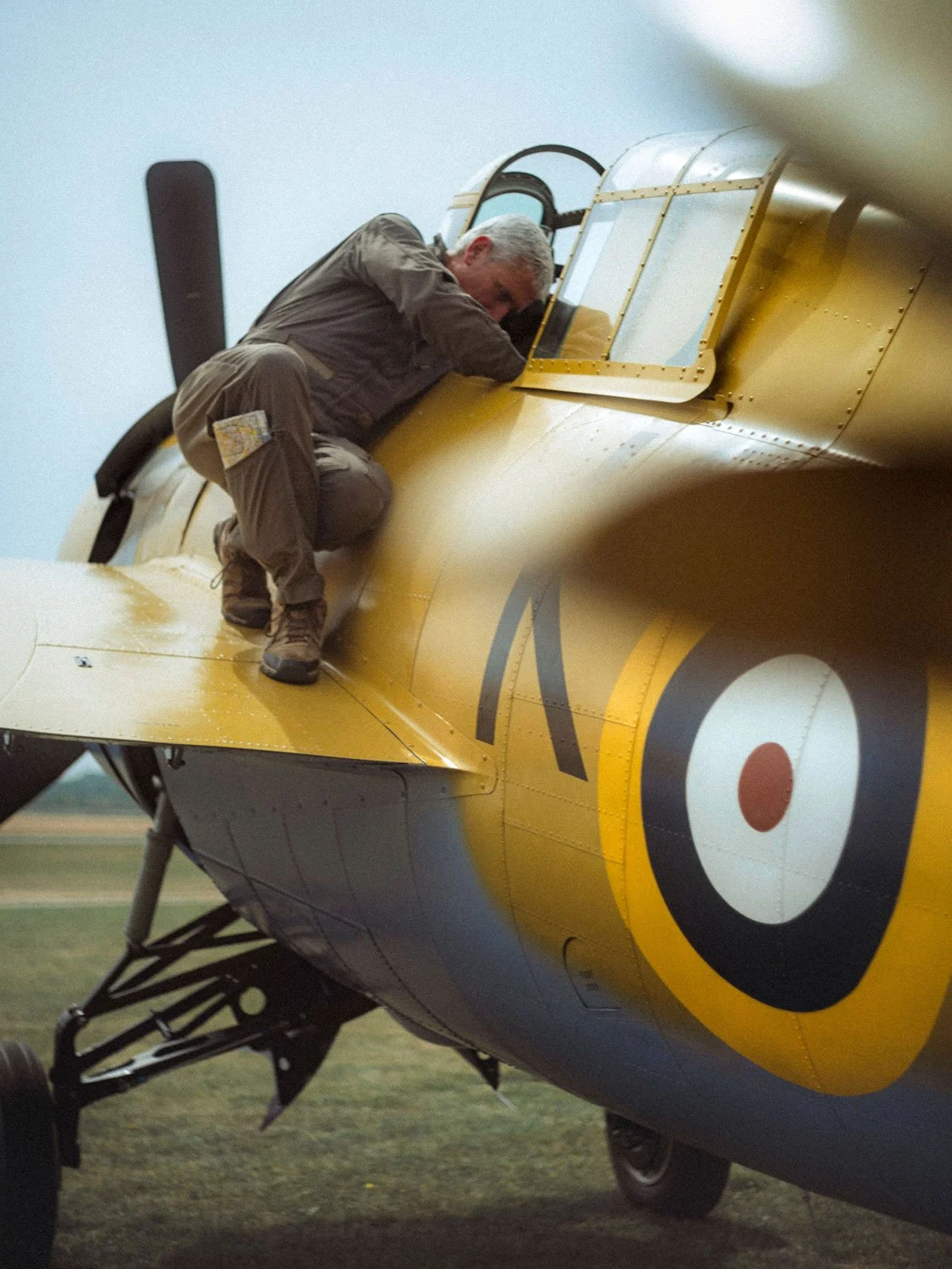 AircraftRestorationCo_Grumman-Wildcat-Martlet-AX733-Flight-Duxford-Pilot-Wing_by-JackHolt.jpg