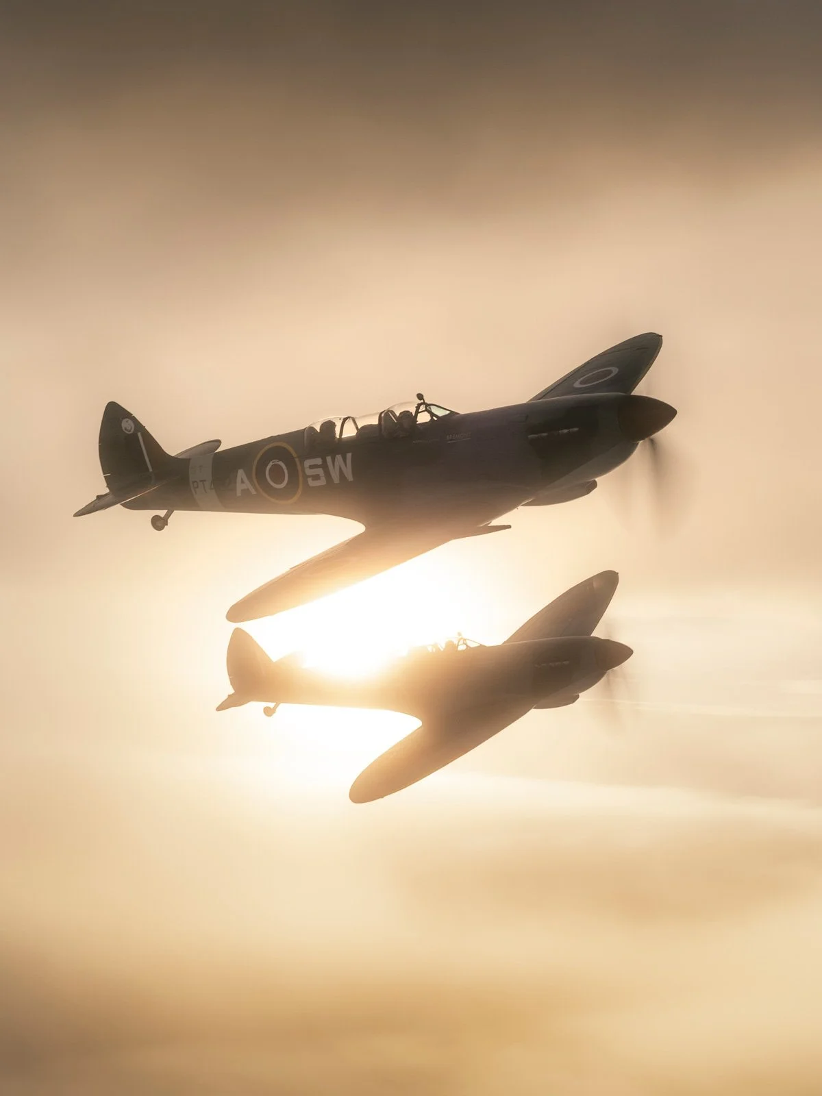 AircraftRestorationCo_Supermarine-Spitfire-PT462-AerialCollective-Experience-Formation-Flight-sunset-Cambridge_by-GeorgeLewisRomain.jpg