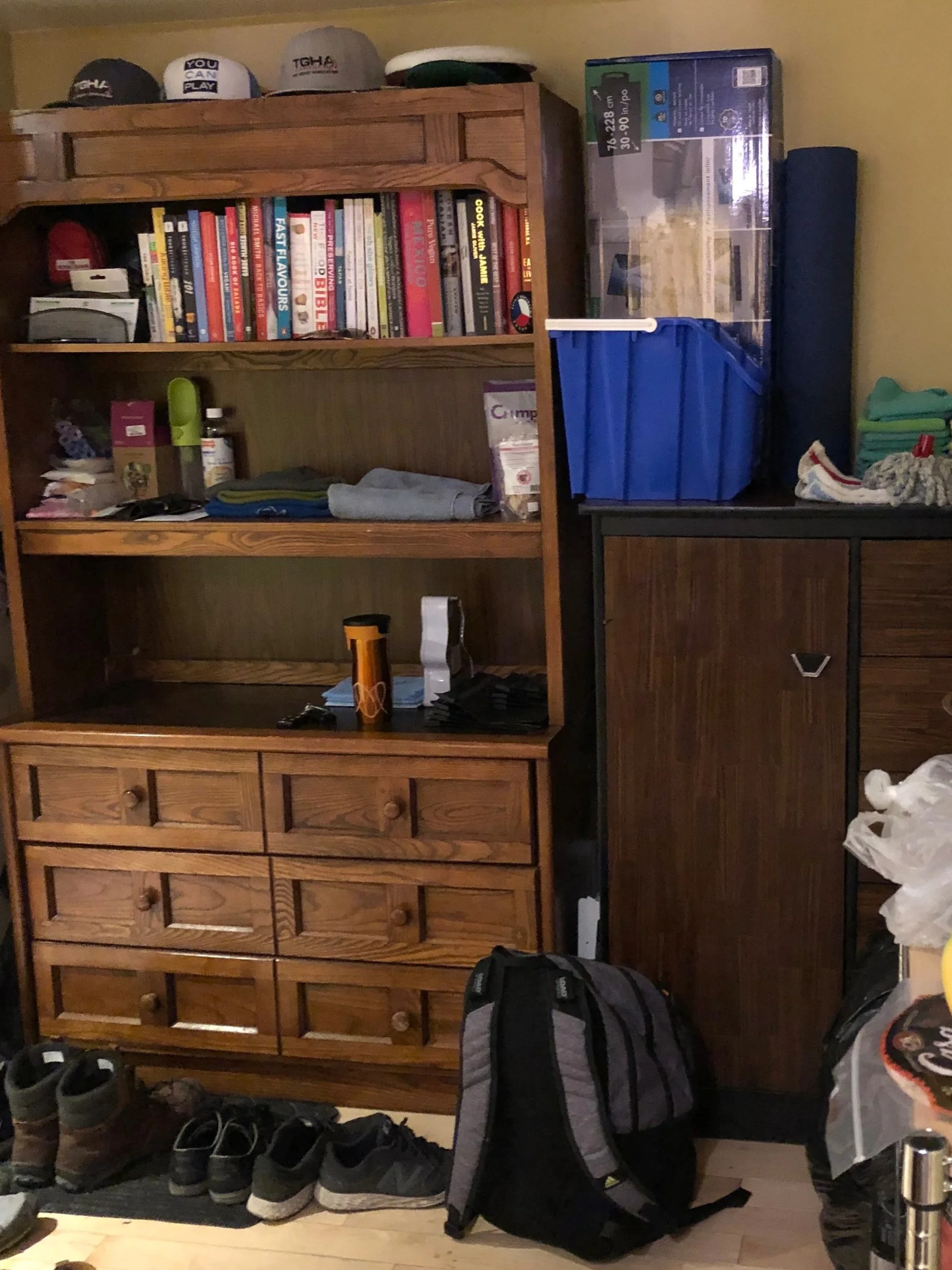 The homeowners’ large hutch offered great open and closed storage so Joel decided to keep it and move it to where the old dining table was.