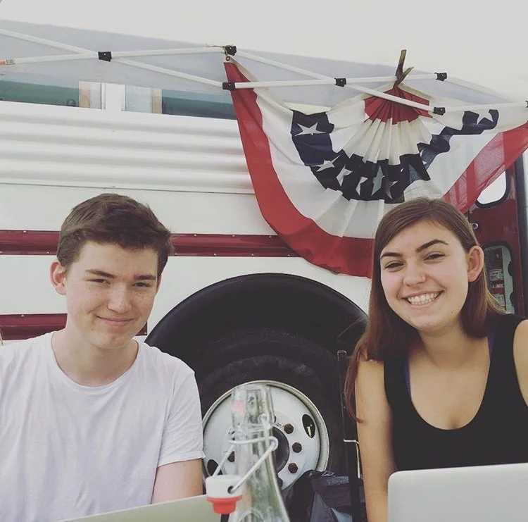 Chris Wedd, our IT Intern, and I making preparations during the week of the Creality Market and Musical Tent Show. 
