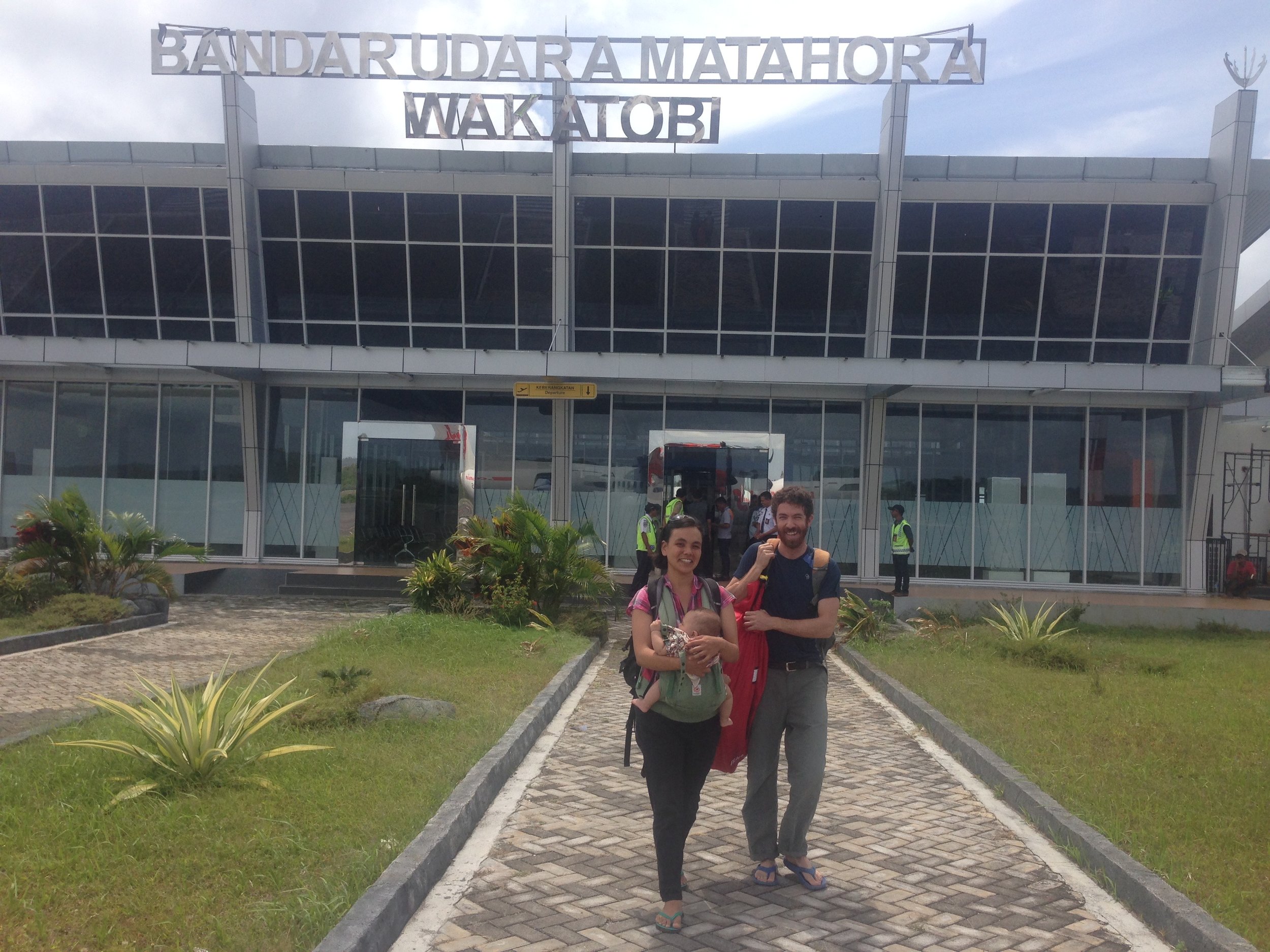 Melati, Brian, and baby Iwan at the airport on Wangi Wangi