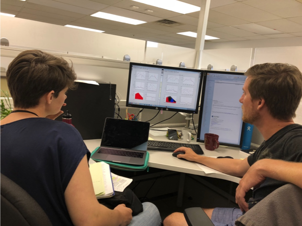 Dr. Romain Lavaud shows Celeste how his sea lettuce model runs in MATLAB. Photo credit: Austin Humphries