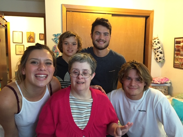 From left to right: Lillia Mora, Trey Mora, Cole Mora, and Ryder Mora with their aunt, Whittney, center.
